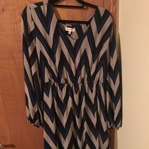 Cocktail length 3/4 sleeve v neck dress